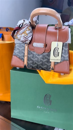 @braidsandbooking on Instagram: "Get at @sclass_yandy to be styled in your designer goods. I’m in my goyard you go girl💁🏾‍♀️"