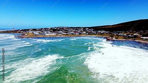 High angle view over bay showing coastal village of Cape Agulhas, South Africa