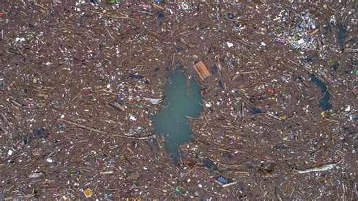 Tons of trash clogs a river in Bosnia. It's a seasonal problem that activists want an end to