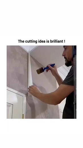 FUNNY MEMES on Instagram: "This video demonstrates a clever technique for joining wallpaper panels, often referred to as a "double cut" or "splice" method. The video begins with a man applying a new section of textured wallpaper over the edge of an existing panel. Instead of trying to align the edges perfectly beforehand, he intentionally overlaps the two pieces by a few inches, using a blue smoothing tool to press them firmly against the wall and ensure a good bond. Once the overlap is secured,