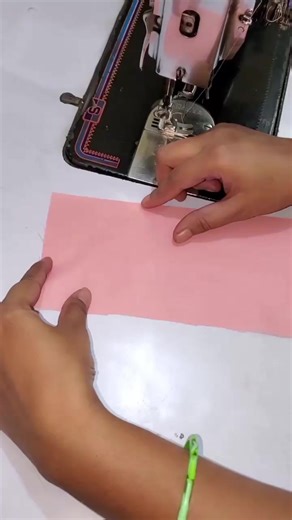 Sewing Pink Fabric with a Sewing Machine