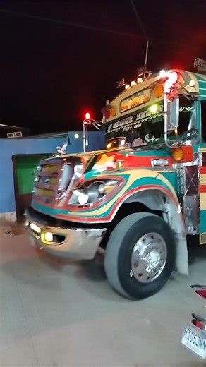 Colorful Vintage Bus in Urban Night Parade