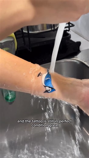 StickerYou | Custom Stickers, Labels & More! on Instagram: "Not the outcome we wanted 💔 Sammy’s saying goodbye to her blue bird tattoo… maybe next year 💙 Make your own custom, high-quality temporary tattoos on StickerYou.com✨ • #stickeryou #customstickers #custommade #stickerart #customprinting #temporarytattoos #customtattoos #waterprooftattoos"