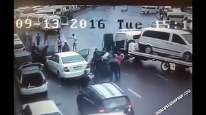 Carjacking gone HORRIBLY wrong: Car thieves who tried to rob an elderly man get beaten up by the entire street