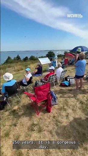 Duke watches the Parade of Sail from Spectacle Island in Boston Harbor