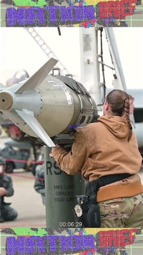 U.S. Air Force Airmen conduct weapon loading on an B-1b Lancer