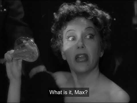 The final scene of Sunset Boulevard (1950) after Nora Desmond has shot Joe Gillis