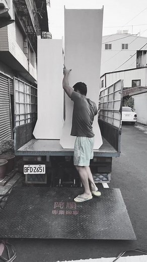 Urban Furniture Moving: A Man's Strong Effort