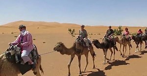 28K views · 141 reactions | Join this group of O.A.T. travelers as they embark on a camel ride through the Sahara Desert. Discover more about this adventure by clicking the "Learn More" buttong below. | Overseas Adventure Travel | Facebook
