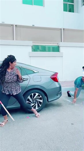 Woman Pops Colorful Balloons in Fun Outdoor Challenge