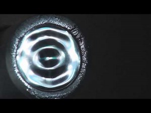 Vibrations of a Soap Membrane. Bessel function example.