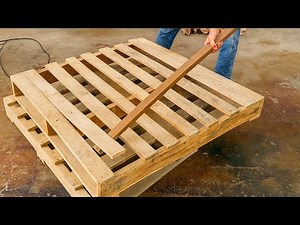 The Skillful Hands of a Talented Carpenter Crafting a Coffee Table from Scrap Pallets
