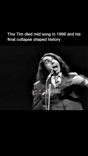 Explaining Past on Instagram: "Tiny Tim died mid song during a show in Minneapolis in 1996. He performed Tiptoe Through The Tulips for an audience at a local gala. Witnesses reported that he looked weak before he walked on stage. He pushed through the performance then collapsed while still singing his signature melody. Staff moved him away from the stage and brought him to a hospital. Doctors reported a fatal heart attack soon after arrival. He was 64. Herbert Butros Khaury was born on April 12