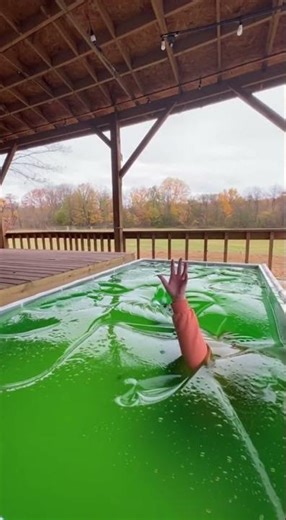 She jumped on the giant JELLO bed… and it SWALLOWED her 😂💚🍮 #funny #shorts