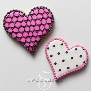 Learn how to make a beautiful set of Valentine's Day cookies in my latest cookie decorating tutorial! Watch the full video here: http://www.sweetambs.com/tutorial/new-valentines-day-cookies/ I've been nominated for a Shorty Award! Vote for me when you have a moment: http://shortyawards.com/9th/sweetambs | SweetAmbs