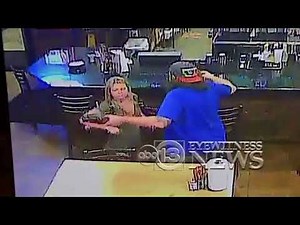 Man hits back woman without spilling his beer