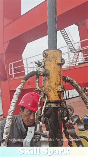 Applying grease to steel cables for maintenance!