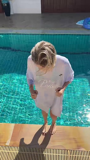 Dramatic Pool Jump Shows Thrilling Splash Action