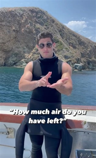 Mastering Scuba Hand Signals: A Dive Into Underwater Communication