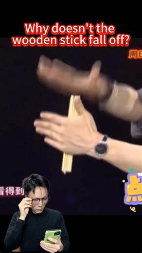 Why doesn't the wooden stick fall off? #magic