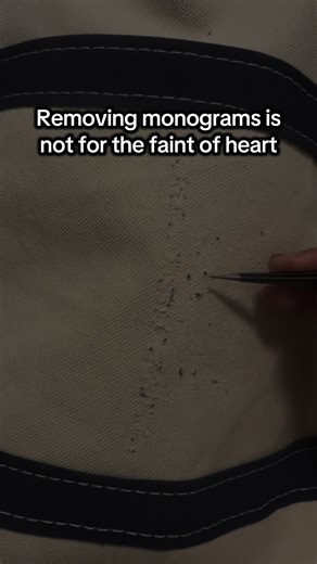 Taking a machine embroidered monogram out…one thread at a time… #monogram #embroidery