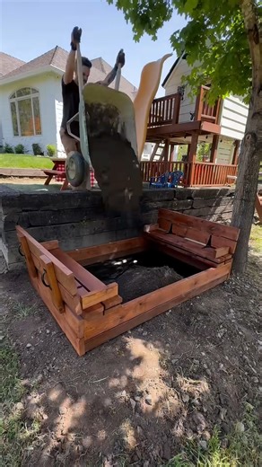 DIY wooden sandbox with convertible bench lid