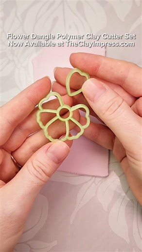I love using Cernit Opaline clay for simpler dangle designs. It's halfway between opaque and translucent clay, so it's just really pretty and soft. It almost looks like translucent ceramic. ☺️ #floralearrings #polymerclaycutters #earringmaking | The Clay Impress