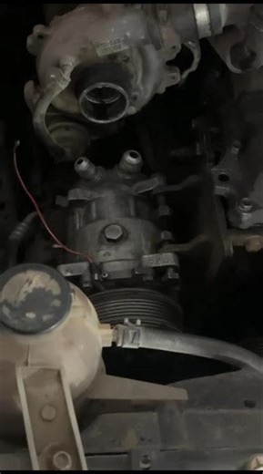 Innova AC compressor alteration fitting #automobile #shortfeed #mechanic #video ￼