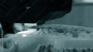 Working 3D printer printing an object from plastic. Printing a model from molten plastic using a 3D printer. Creation of a form by a 3D printer. Additive progressive new modern 3d printer technology