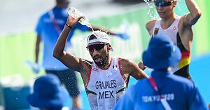 How are athletes, and reporters, dealing with the heat and lack of fans in Tokyo?