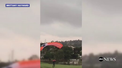 Former Navy SEAL skydives into wedding reception