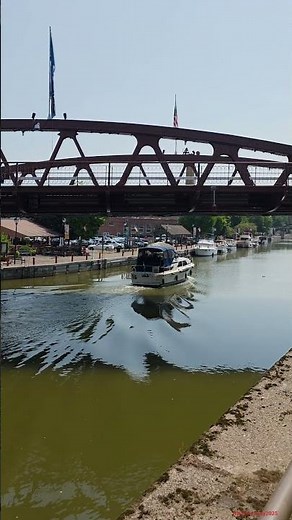 Boat passing under the lift bridge in Fairport, NY 7/30/25