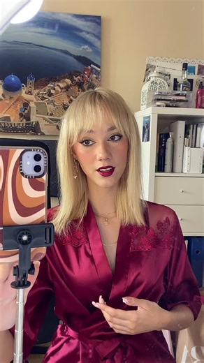 Blonde Vlogger in Stylish Red Satin Robe