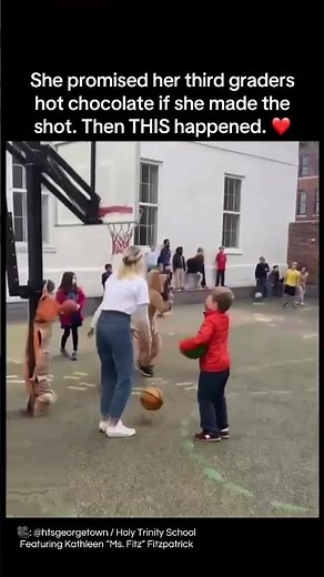 She promised her third graders hot chocolate if she made the shot. Then THIS happened. ❤️