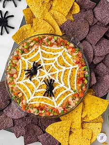 Amy | Belly Full on Instagram: "This easy Spiderweb Dip is a fun and delicious twist on classic 7-layer dip, all decorated for Halloween. Great for snacking and parties!"
