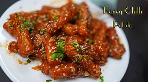 34K views · 207 reactions | Crispy Honey Chilli Potato recipe | how to make crispy honey chilli potato | Priya's Kitchen | Facebook