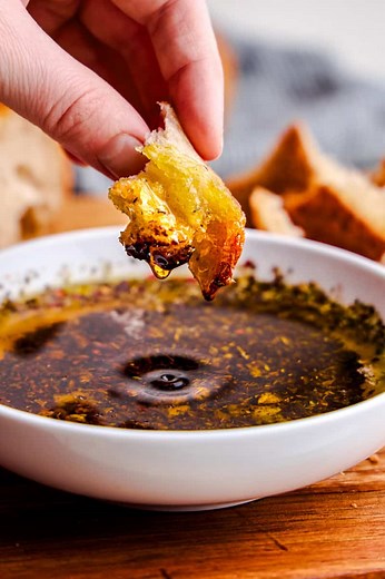 This Italian olive oil bread dip is simple, bold, and downright addictive—good olive oil swirled with garlic, herbs, and a touch of balsamic for dipping crusty bread. Fancy restaurant vibes right at your own table. https://thestayathomechef.com/italian-olive-oil-bread-dip/ | The Stay At Home Chef