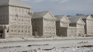 Lakefront homes encrusted in ice