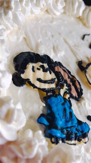 Charlie Brown and Lucy football themed cheesecake #peanuts #charliebrown #lucy #football #superbowl