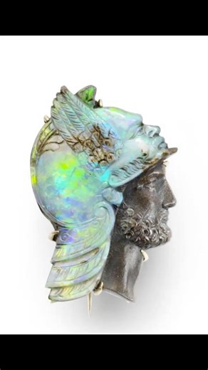 Why limit cameos to shell and agate when you can do this with opal? Wilhelm Schmidt (1845-1938) pioneered the technique of carving opal cameos in the late 19th century, utilizing the matrix and often carving the backs, and even the sides. Here are a few examples of Schmidt’s opal carvings, starting with a cameo I featured on my blog: https://thejewelryloupe.com/a-short-history-the-delicate-art-of-carved-opal-jewels/ Lapidaries rarely signed their work in those days and Schmidt was no exception. 