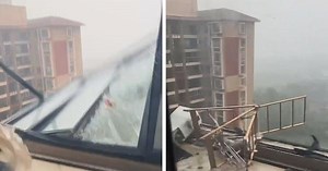 Terrifying moment Typhoon Yagi rips open balcony window