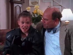 Alex Mack sneezing electricity in her leather jacket