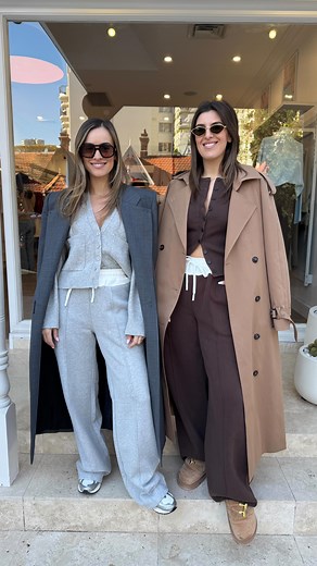 Now this is how you elevate a tracksuit. It’s all in the styling, ladies  Both Lia and Renee are wearing the Terry Tracksuit pants by @sneakylink.brand but Lia paired hers with the Frances Cardigan and finished it off with the Sneaky Link Trench Coat. Renee styled hers with the Stevie Cardigan and the Camilla and Marc Seidler Coat  | Girls With Gems | Facebook