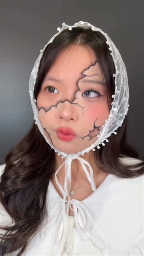 JEI on Instagram: "trying the broken doll makeup trend! 🧸🎀 #brokendollmakeup"