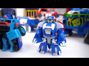 Rescue Bots Optimus and Chase Dinobot Catch a Bank Robber!
