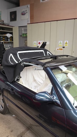 Another convertible replacement in progress—this one's a Mercedes SL500; the soft top is two-piece w
