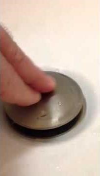 Bath tub drain repair Kohler toe push