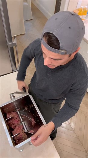 Manolo on Instagram: "ENOUGH WITH THE SMASH BURGERS! SMASH IS BAD, JUICY IS GOOD! Get the juiciest, most drool worthy burgers by mixing all of your spices and ingredients INTO the meat itself and not smashing it out. This easy to use manual meat mixer from @shoptemu makes it so easy and it’s also great for making sausages. Use the code dxr4522 to get yourself one! RECIPE 2 lbs ground meat 1 white onion, grated 2 garlic cloves, grated 1 tsp kosher salt 1/2 tsp black pepper 1/2 tsp Hungarian papri