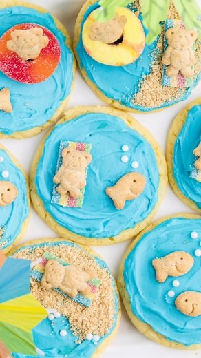 BEACH COOKIES ☀️🦀🐠🐚🪸🌊 start with an easy cake mix cookie recipe, ocean water blue frosting, and decorated with teddy grahams for a sunny day at the beach. - - - Grab the full #recipe here —-> https://happyfamilyrecipes.com/beach-cookies-made-with-a-cake-mix/ | Together as Family - Recipes from my family's kitchen to yours