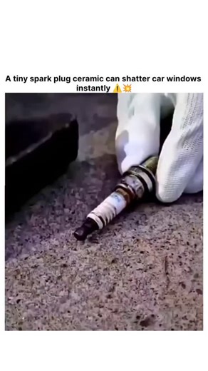 Adnan Bhatt on Instagram: "This post shares a 12.93-second video demonstrating a surprising physical reaction, captioned "A tiny spark plug ceramic can shatter car windows instantly ⚠️💥". The clip features the process of breaking the white ceramic insulator of a spark plug into small shards and throwing a single piece at a tempered glass window, which immediately spiderwebs and collapses. Amassing 15 million views and 180,000 likes within just a few hours, the footage has stunned viewers by sho